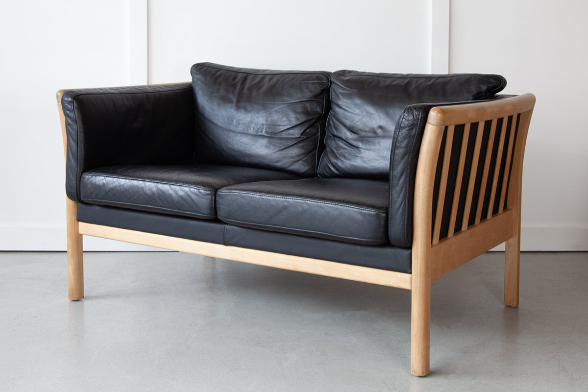 Black Leather Two-Seater Sofa