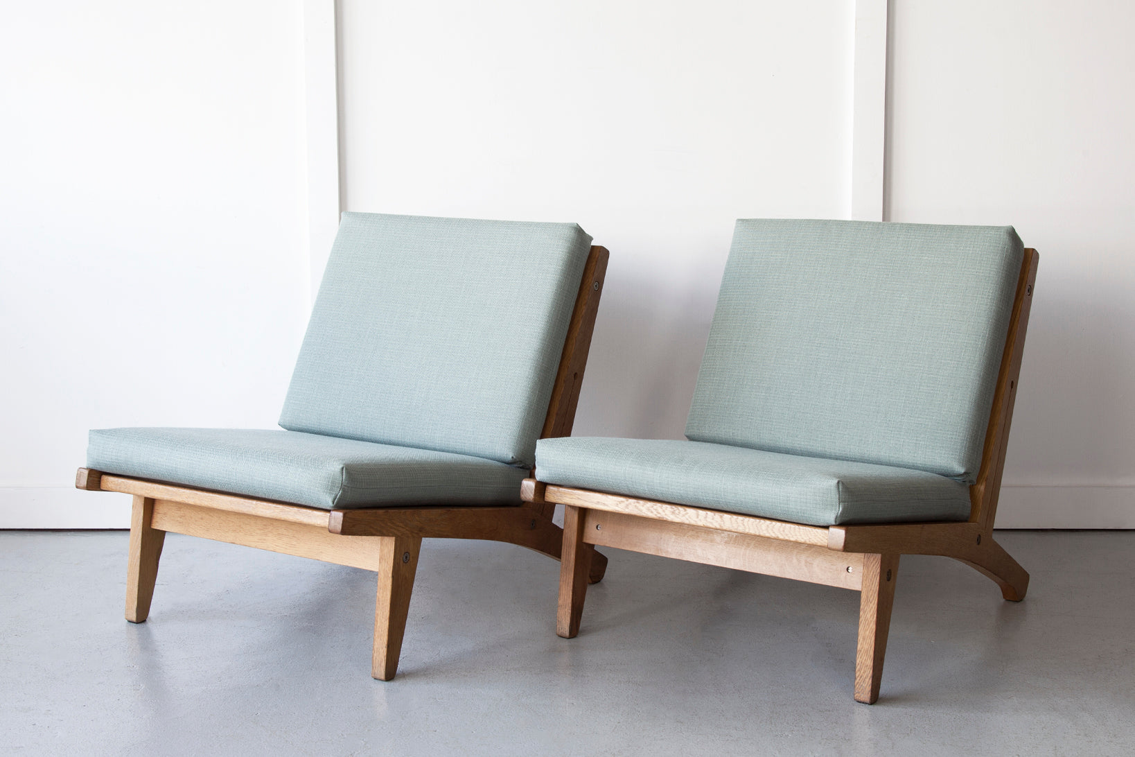 A Pair of Hans J. Wegner Easy Chairs, Model GE-370